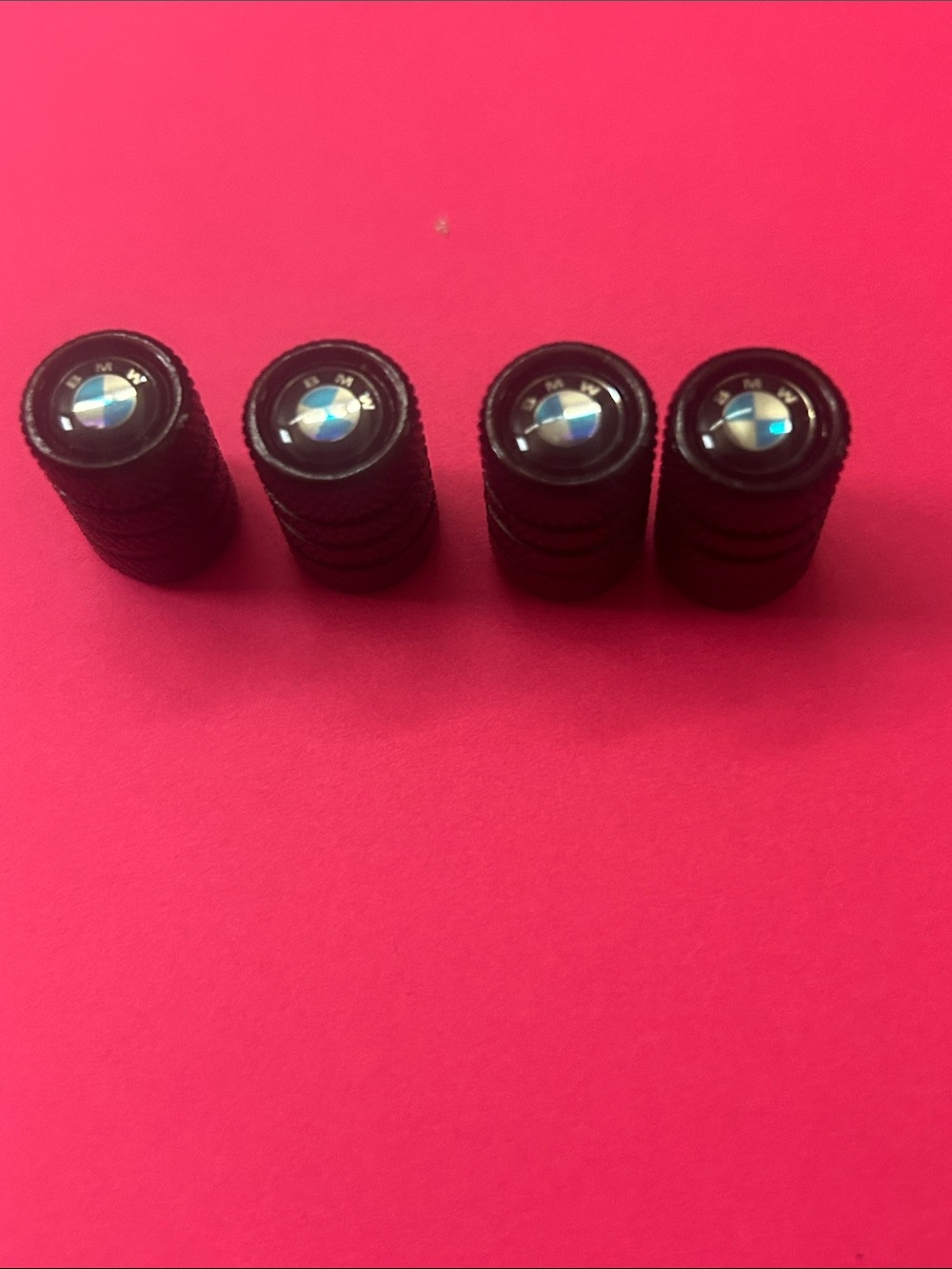 BMW Black Valve Stem Caps with Blue & White Emblem - Set of 4